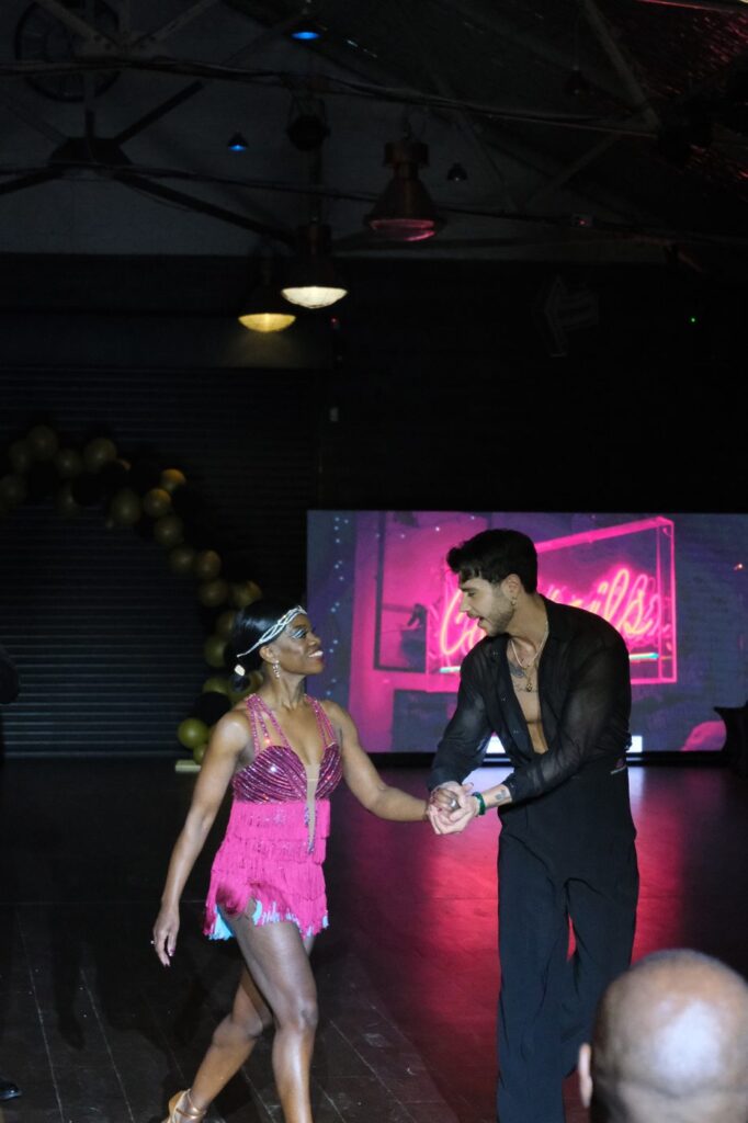 A Dance Amore student dancing Latin with a professional instructor
