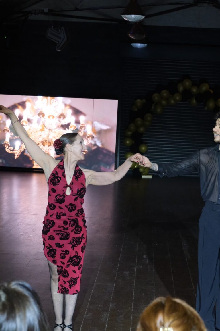 A student dancing Rumba with a professional instructor at Dance Amore